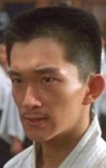 Кэндзи Танигаки (Kenji Tanigaki)